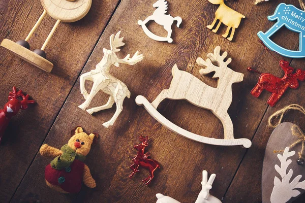 Christmas Background Set Lot Different Deer Toys Dark Wooden Board — Stock Photo, Image