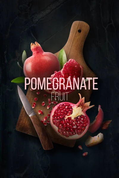 Fresh ripe pomegranate over fark — Stock Photo, Image