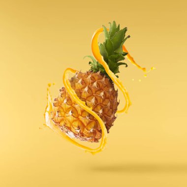 Havada uçan taze olgun bütün ve dilim ile bebek Ananas kesilmiş