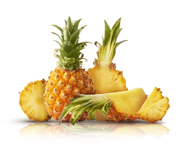 Fresh ripe whole and cut baby Pineapple with slices and leaves — Stock Photo, Image