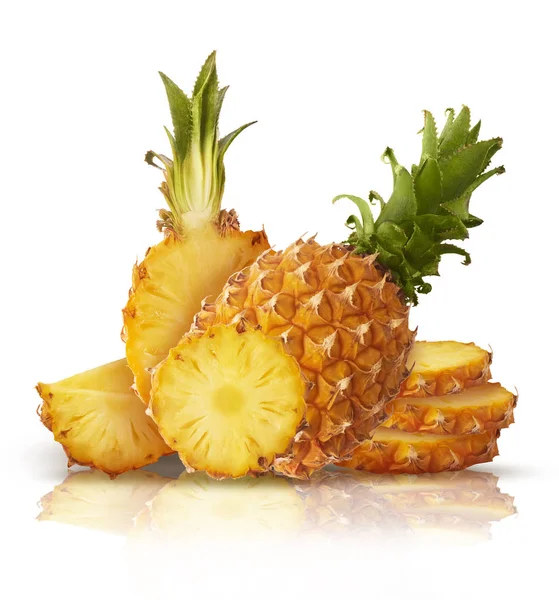 Fresh ripe whole and cut baby Pineapple with slices and leaves — Stock Photo, Image