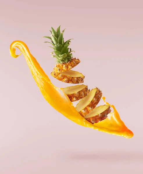 Flying in air fresh ripe whole and cut baby Pineapple with slice — Stock Photo, Image