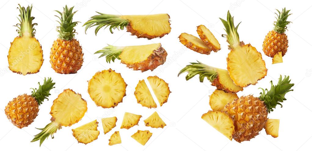 Fresh ripe whole and cut baby Pineapple with slices and leaves 