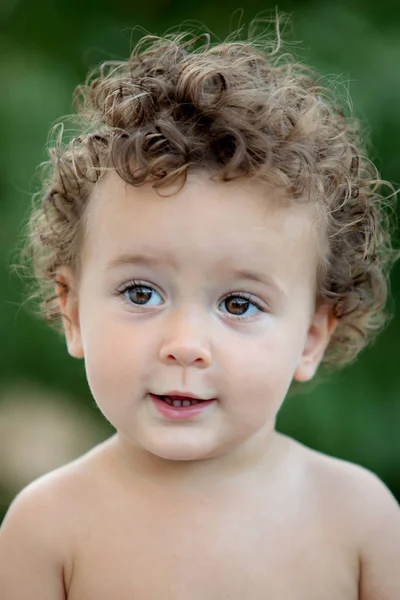 Beautiful Baby Curly Hair Garden Shirt — Stock Photo, Image