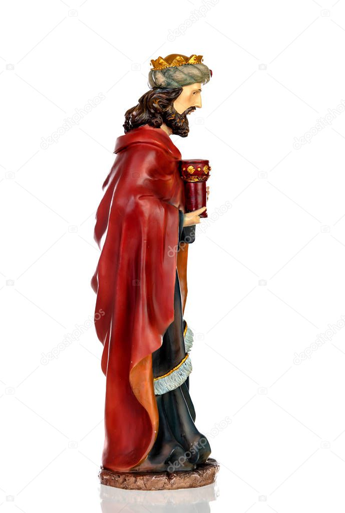 Gaspar, one of the three wise men. Ceramic figure isolated on white background
