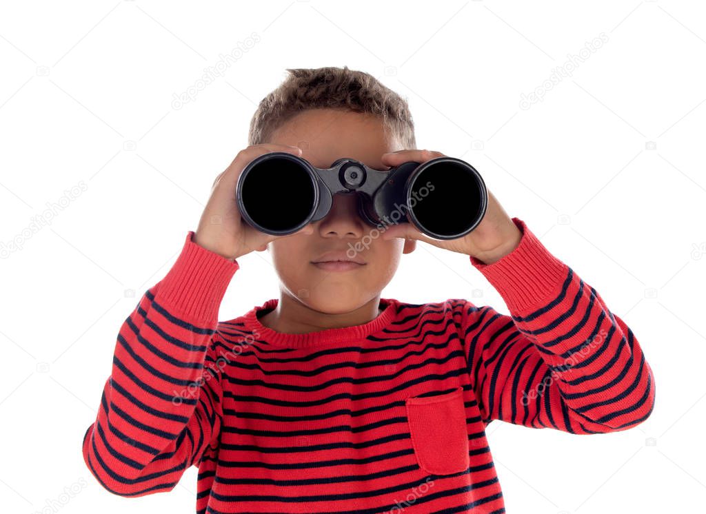 Latin child looking through a binoculars isolated on a white background