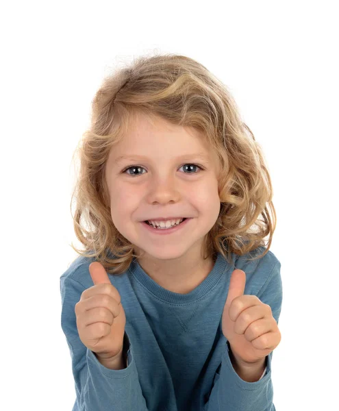 可爱的小男孩在蓝色套头衫显示竖起大拇指孤立在白色背景 — 图库照片