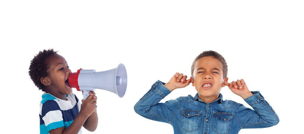 Two happy small children saying Ok and laughing isolated on a white background