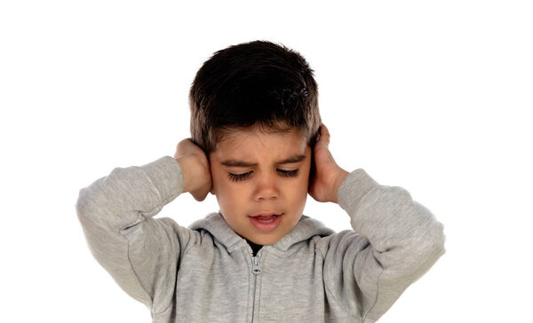 Small child covering his ears isoalted on a white background