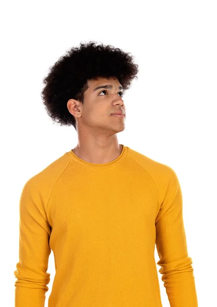 Pensive teenager boy wiht yellow t-shirt — Stock Photo, Image