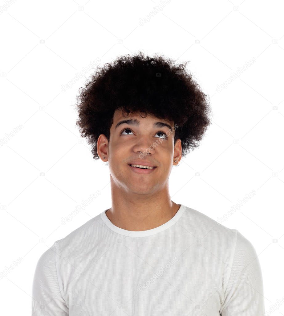 Pensive teenager boy wiht afro hairstyle