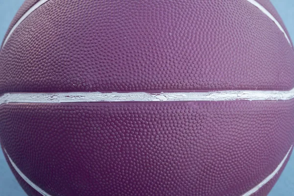 Purple basketball ball with white lines — Stock Photo, Image