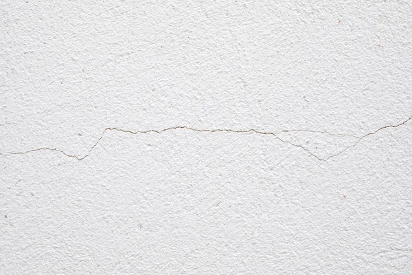 Crepa in un muro bianco — Foto Stock