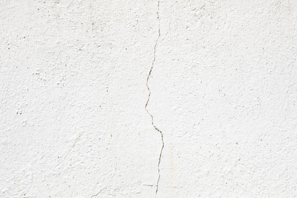 Crepa in un muro bianco — Foto Stock