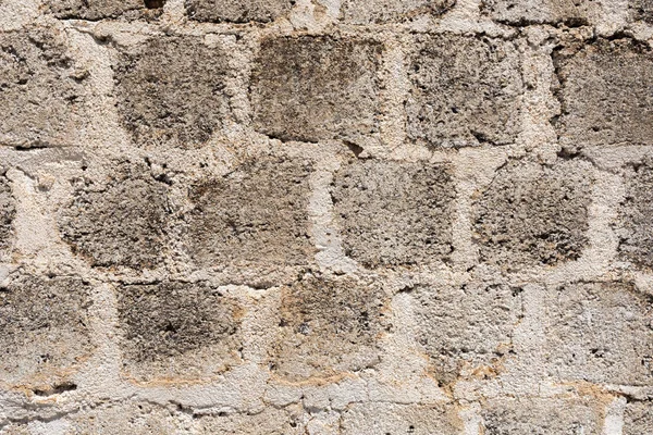 Серая кирпичная стена — стоковое фото