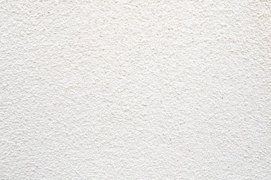 Çimento tuğla yüzeyli beyaz duvar