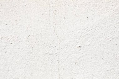 Çimento tuğla yüzeyi ile beyaz bir duvar crack