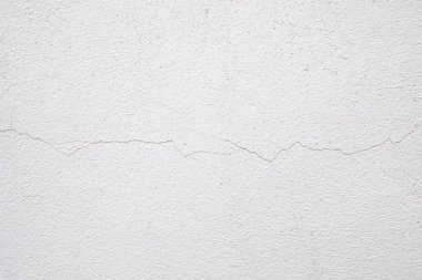 Çimento tuğla yüzeyi ile beyaz bir duvar crack