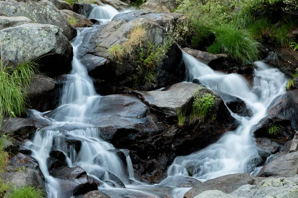 Beautiful waterfall and big rocks — Stock Photo, Image