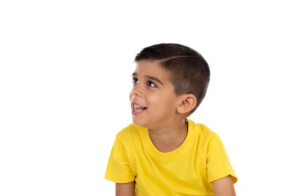 Zamyślony dziecko z żółty t-shirt — Zdjęcie stockowe