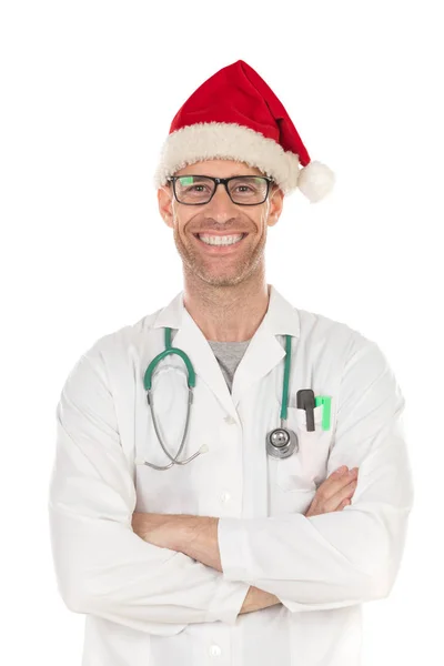 Schöner Arzt mit Weihnachtsmütze — Stockfoto