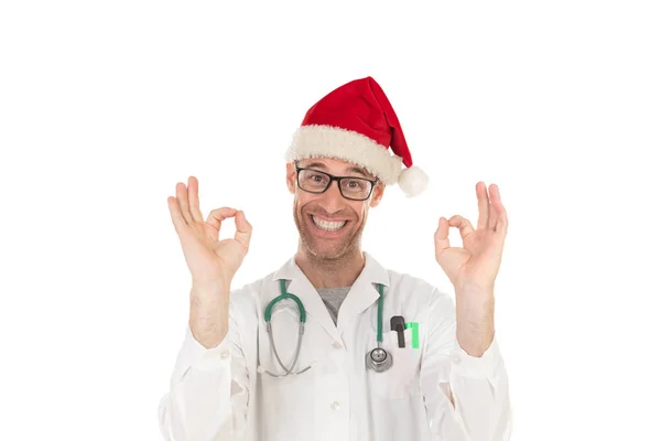 Handsome doctor with christmas hat wearing a Christmas hat — Stock Photo, Image