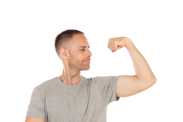 Knappe Man Toont Zijn Biceps Geïsoleerd Een Witte Achtergrond — Stockfoto