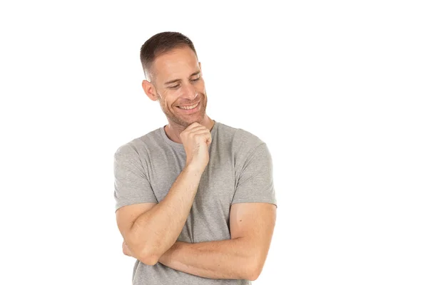 Nachdenklicher Typ Mit Grauem Shirt Auf Weißem Hintergrund — Stockfoto