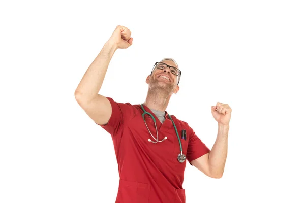 Médico vencedor com uniforme vermelho — Fotografia de Stock