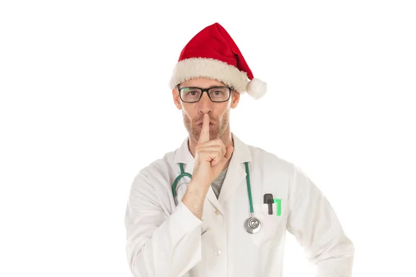 Stilig läkare med Chirstmas hatt beställning tystnad — Stockfoto