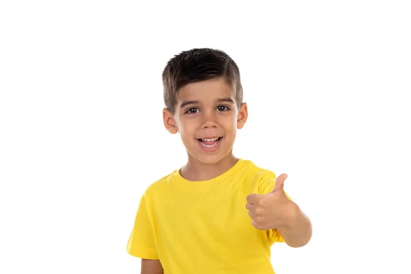 Criança excitada com camiseta amarela — Fotografia de Stock