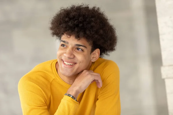 Pensive teenager with afro hairstyle — Stock Photo, Image