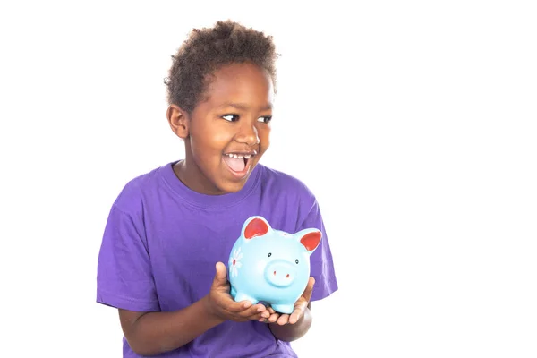 Funny african Child with a piggybank — Stock Photo, Image