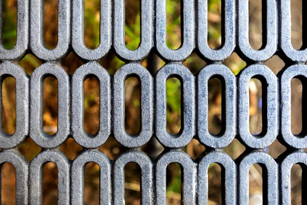 Parede de treliça de aço com um belo padrão de curva — Fotografia de Stock