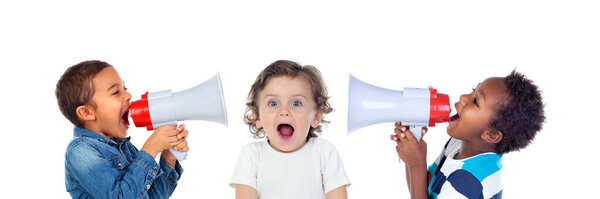 Funny children playing with a megaphone isolated on a white background