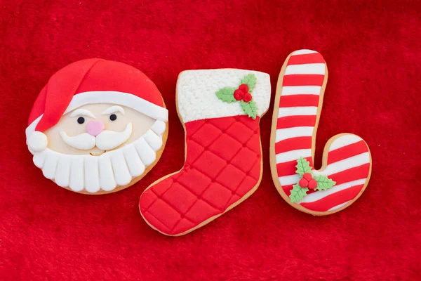 Biscotti Natale Con Santa Face Sfondo Rosso Pelliccia — Foto Stock