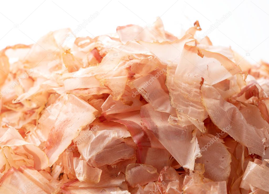 Traditional Japanese food placed on a white background. Katsuobush