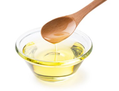 Sebze yağını tahta kaşıkla cam bir kaseye dök..