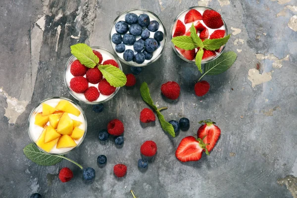 Yogurt and berry. Fresh fruit yogurt with fresh berries and peaches.