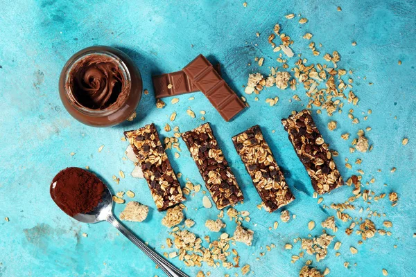 Granola bar. Healthy sweet dessert snack. Cereal granola bar with nuts and chocolate