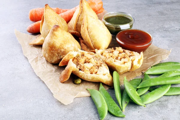 Indian special traditional street food punjabi samosa or Coxinha, Croquete and other Fried Brazilian Snacks