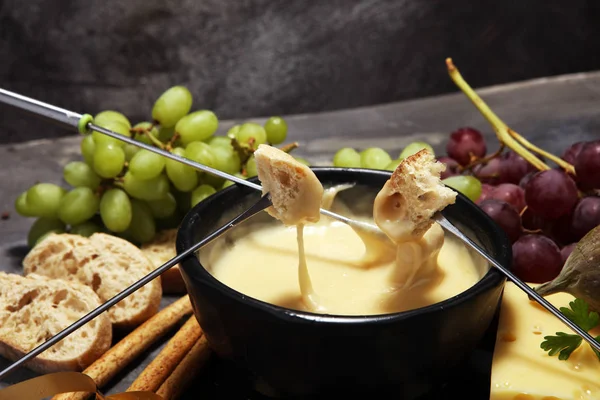 Gourmet Swiss Fondue Dinner Winter Evening Assorted Cheeses Board Alongside — Stock Photo, Image
