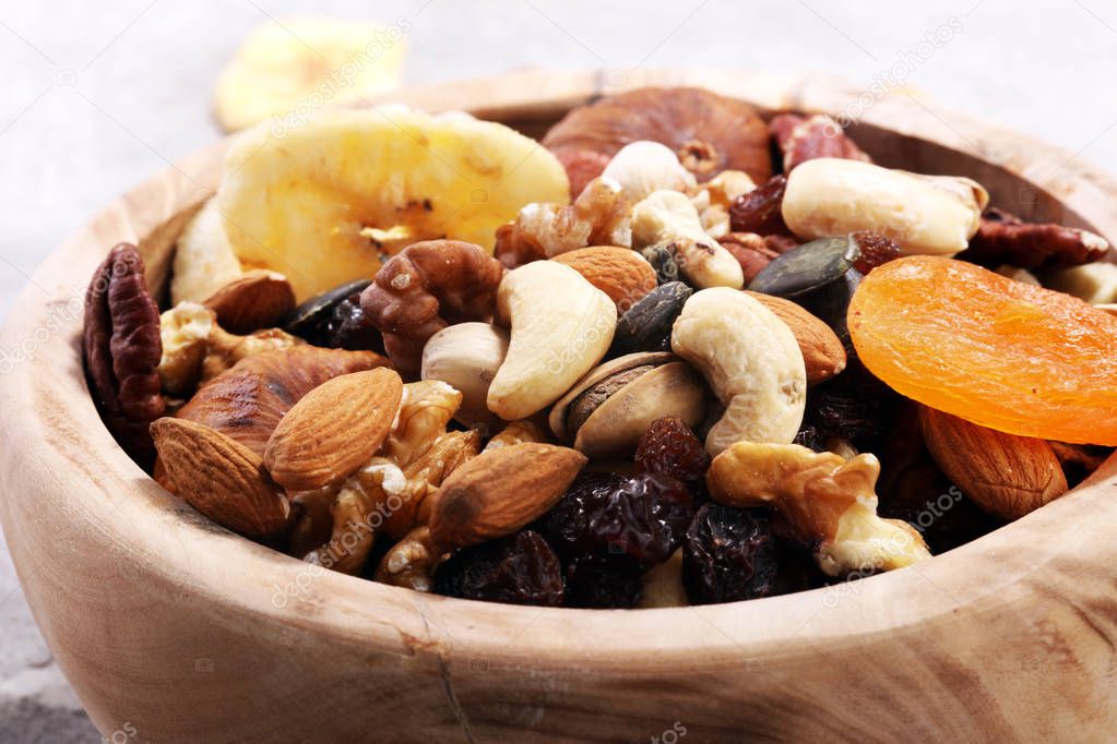 Composition with dried fruits and assorted healthy nuts.