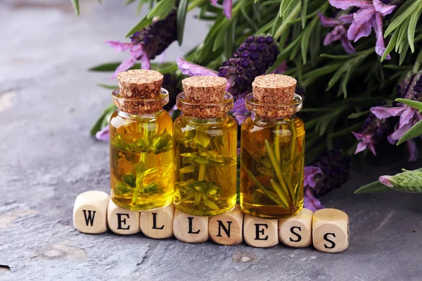 Lavender Oil Glass Bottle Background Fresh Flowers Andwellness Sign Wooden — Stock Photo, Image
