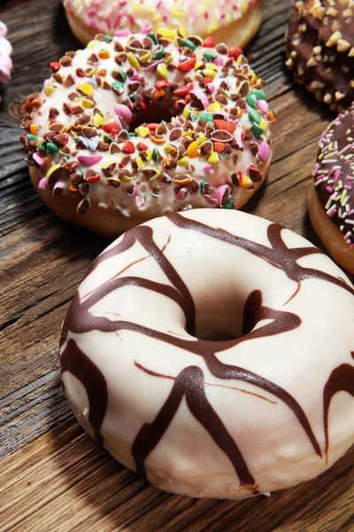Assorted Donuts Chocolate Frosted Pink Glazed Sprinkles Donuts Royalty Free Stock Photos