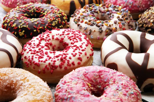 Assorted Donuts Chocolate Frosted Pink Glazed Sprinkles Donuts Stock Photo