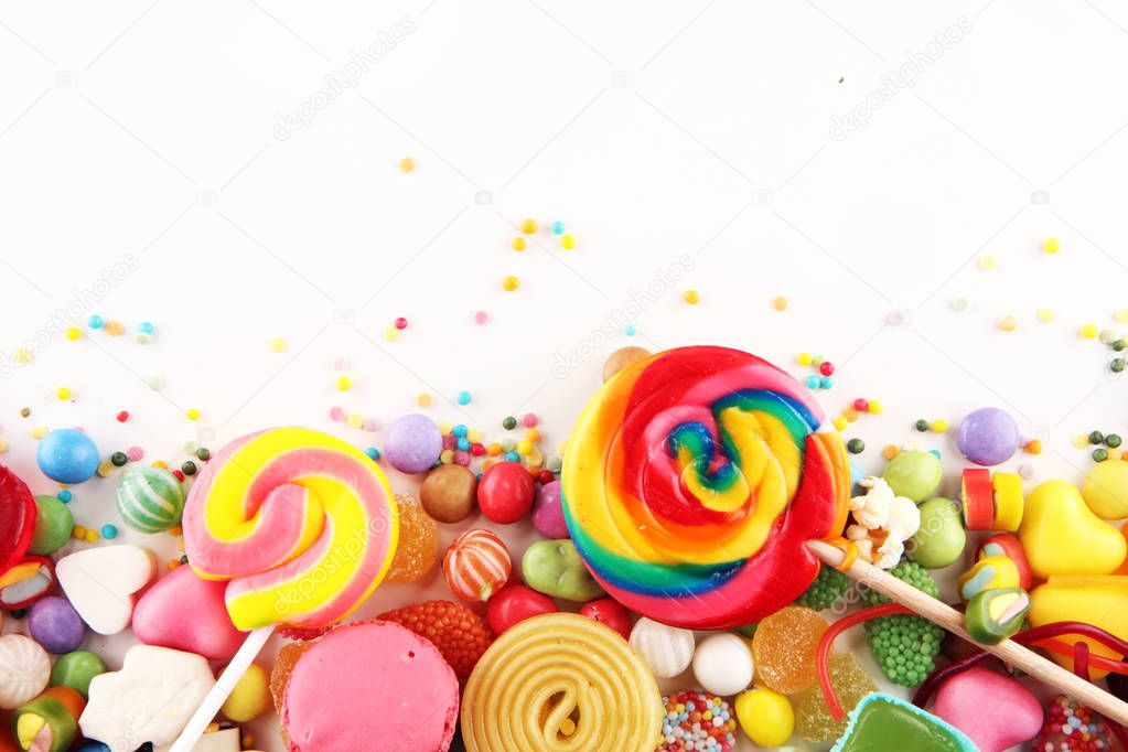 candies with jelly and sugar. colorful array of different childs sweets and treats