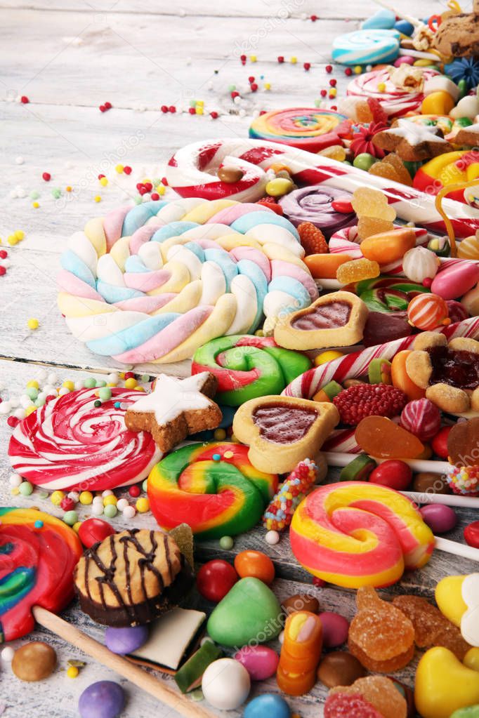 candies with jelly and sugar. colorful array of different childs sweets and treats