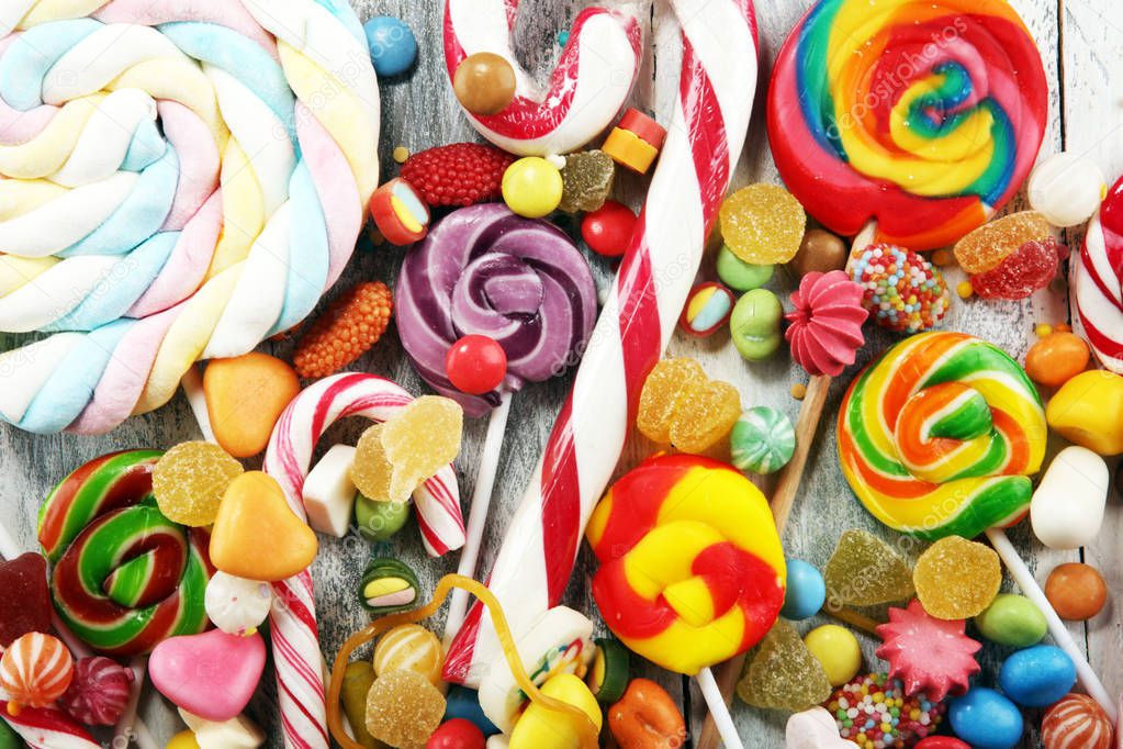 candies with jelly and sugar. colorful array of different childs sweets and treats