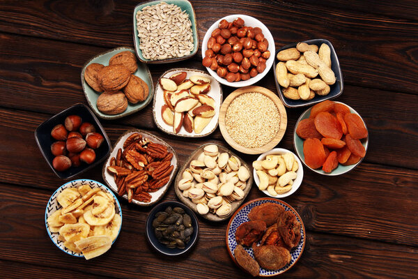 Composition with dried fruits and assorted healthy nuts.